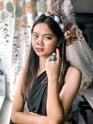 Cute tall Asian teen exposes her tits and pussy