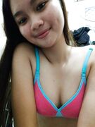 Cute tall Asian teen exposes her tits and pussy