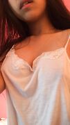 Cute heart between Asian teen boobs