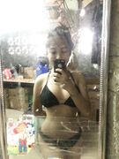 Cute heart between Asian teen boobs