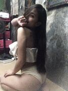 Cute heart between Asian teen boobs