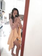 Cute heart between Asian teen boobs