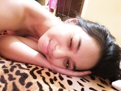 Nudes of amateur Asian babe with braces