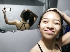 Nudes of amateur Asian babe with braces