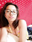 Nudes of amateur Asian babe with braces