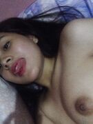 Asian teen exposing her pussy and small boobs
