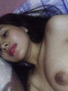 Asian teen exposing her pussy and small boobs