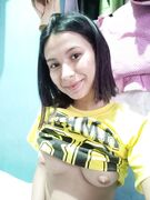 Nude posing in bathroom at home