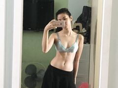 Hot slim Asian coed exposes her naked body to mirror