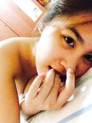 Naked in bed taking selfies Asian college girl