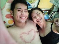 Amateur girl with braces spreads her Asian pussy