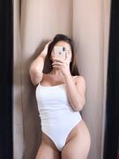 Nudes of an Asian chick with big booty and nice tits