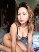 Sexy filipina spreads her legs in bed