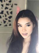 Super hot Asian slut shows her naked body off