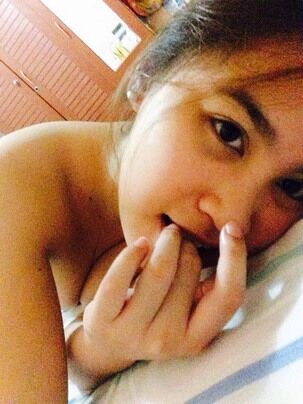 Naked in bed taking selfies Asian college girl
